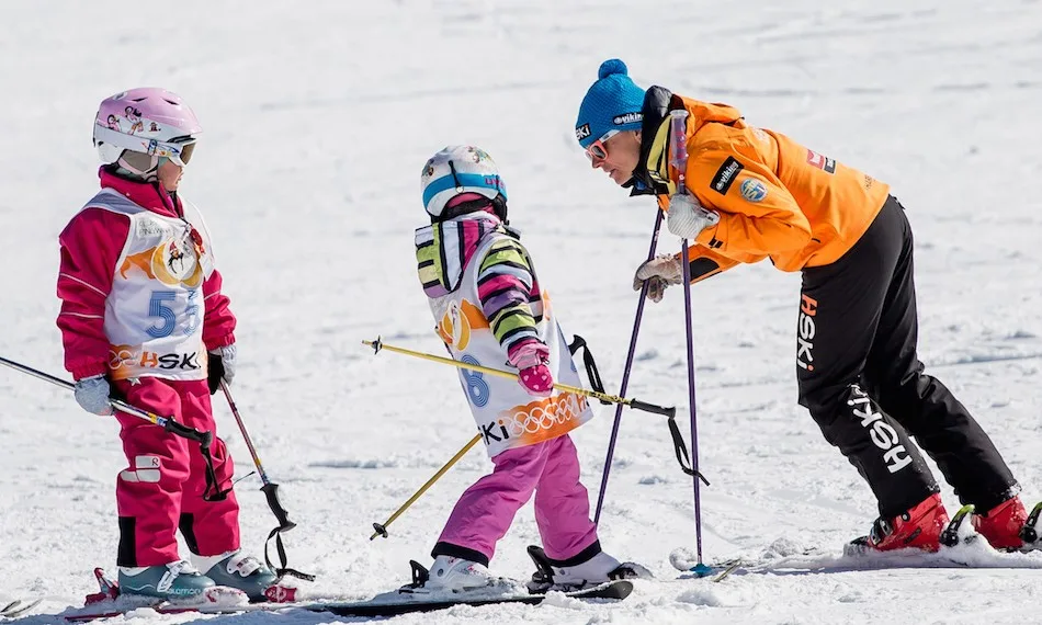 Child skiing during a lesson